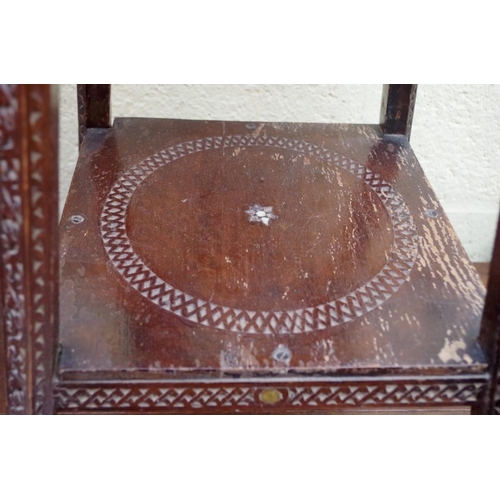 1177 - An ottoman carved wood two tier occasional table, 42.5cm wide. 