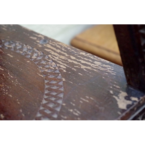 1177 - An ottoman carved wood two tier occasional table, 42.5cm wide. 