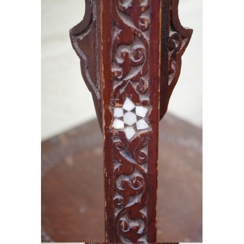 1177 - An ottoman carved wood two tier occasional table, 42.5cm wide. 