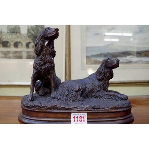 1181 - A bronze figure group of two gun dogs, 27cm wide.