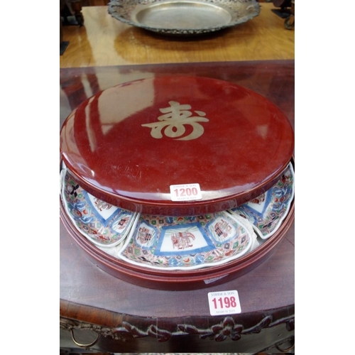 1200 - A Chinese Imari porcelain seven piece hors d'oeuvres set, in lacquer box and cover, 33cm diameter.&n... 