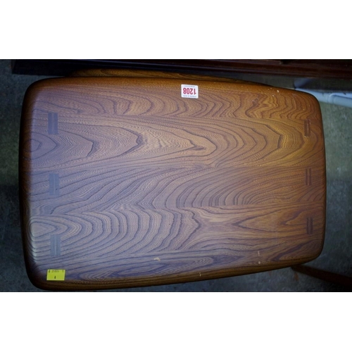 1208 - A nest of three Ercol elm tables, largest 57cm wide.