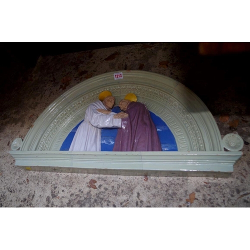 1213 - A Cantagalli arched relief plaque of two saints, 69.5cm wide.