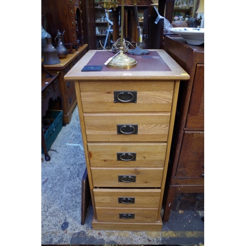 1214 - A contemporary pale oak filing cabinet, 51cm wide. 