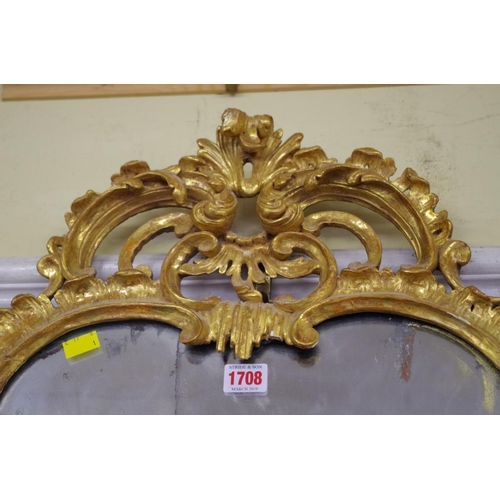 1708 - An 18th century carved and giltwood pier mirror, 97 x 57.5cm.