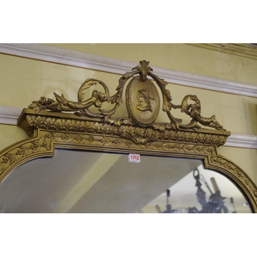 1712 - A large gilt gesso framed mirror, 223 x 92cm.