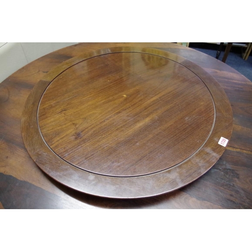 1720 - A rosewood Lazy Susan, 76.5cm wide. 