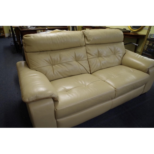 1721 - A modern oatmeal leather settee, 198cm wide. 