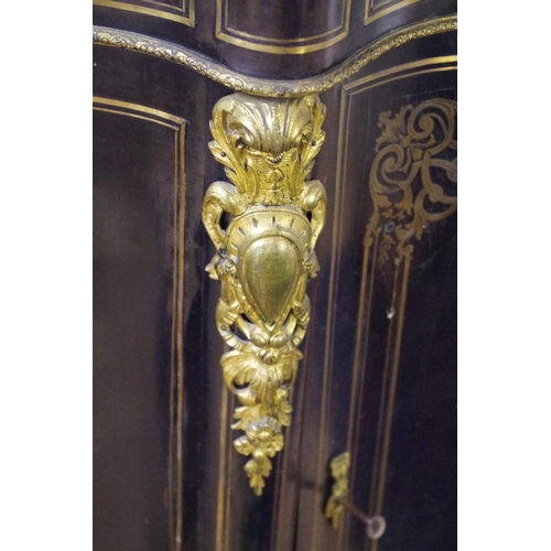 1734 - A 19th century ebonized brass inlaid and marble top credenza, of shaped outline, 115.5cm wide.... 