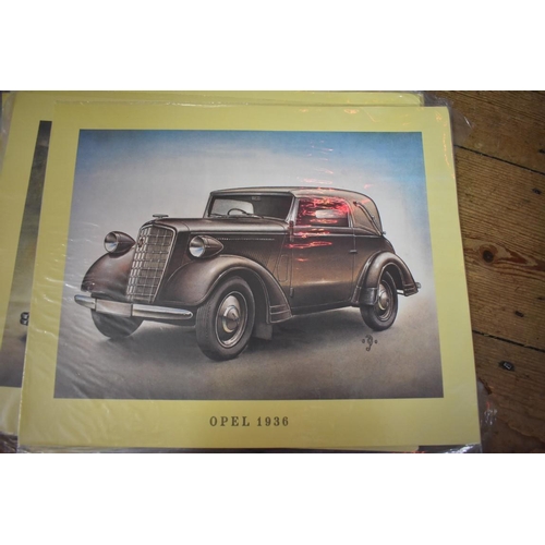 1200A - A collection of twenty-seven coloured prints of vintage motor cars, I.24 x 32cm, unframed. ... 