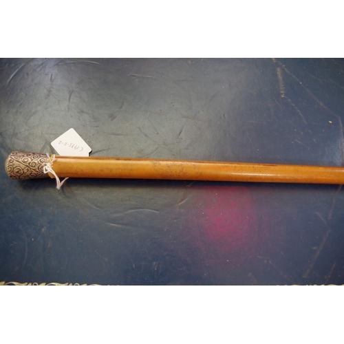 1745a - A silver mounted malacca cane.