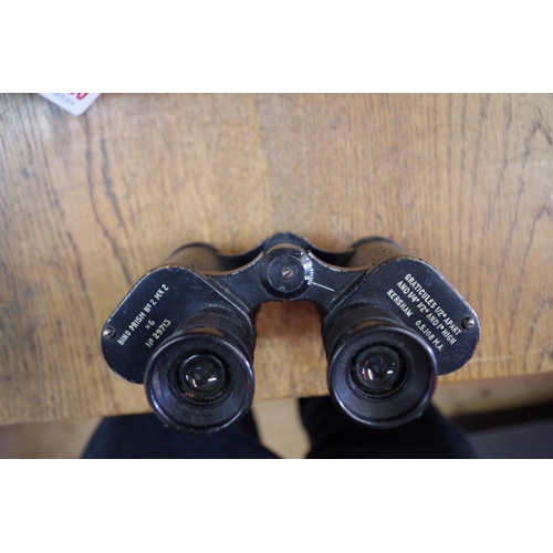 1753 - A pair of Kershaw binoculars, with broad arrow stamp; together with two further pairs of vintag... 