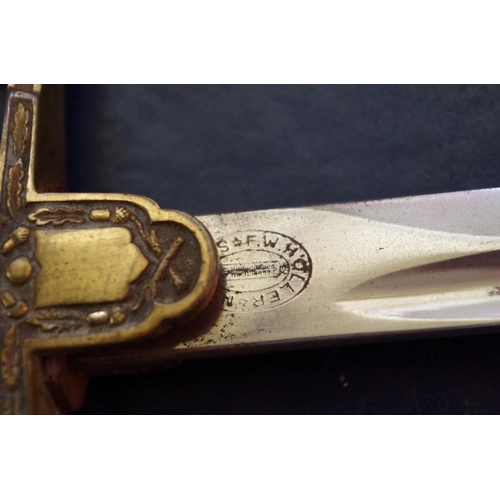 1758 - An Army Officer's sword and steel scabbard, the blade inscribed with maker's mark.