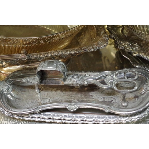 86 - An electroplated twin handled oval tray; together with other silver plated items.