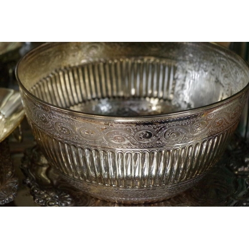 86 - An electroplated twin handled oval tray; together with other silver plated items.