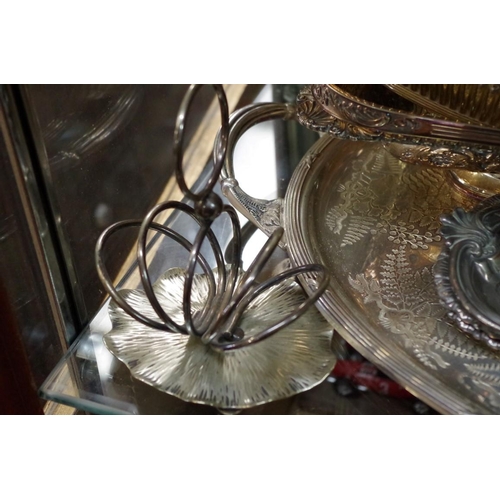 86 - An electroplated twin handled oval tray; together with other silver plated items.