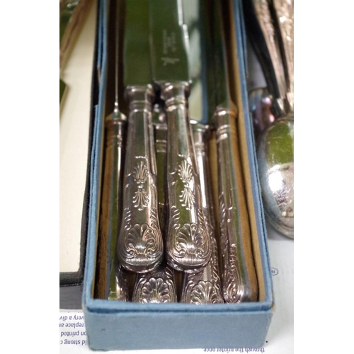 87 - Six silver plated soup spoons; together with twelve Kings pattern stainless steel knives; and a Vict... 