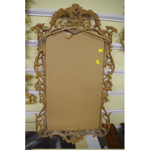 1708 - An 18th century carved and giltwood pier mirror, 97 x 57.5cm.