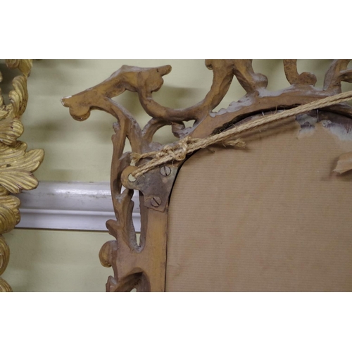 1708 - An 18th century carved and giltwood pier mirror, 97 x 57.5cm.