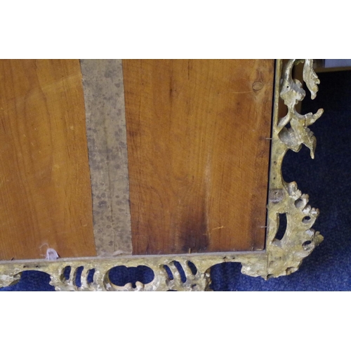 1709 - An 18th century carved and giltwood framed pier mirror, 112 x 64cm.