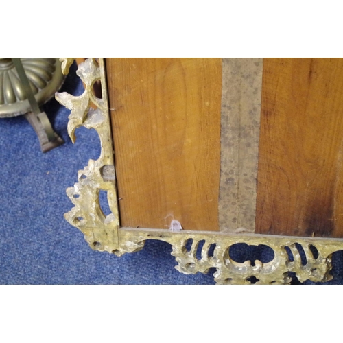 1709 - An 18th century carved and giltwood framed pier mirror, 112 x 64cm.