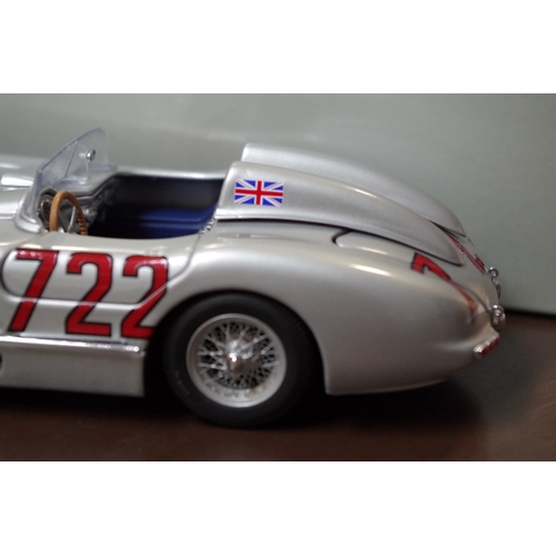 514 - A Minichamps 1:24 scale '1955 Mercedes Benz 300SL Mille Miglia', signed by Stirling Moss, boxed.... 