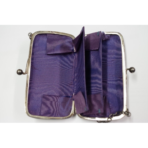 68 - An Edwardian silver purse, by F H L, Birmingham 1915; three silver cigarette cases; and three other ... 