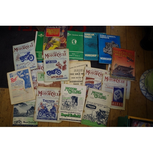 694 - A large collection of motorcycle and automobilia leaflets and publications.