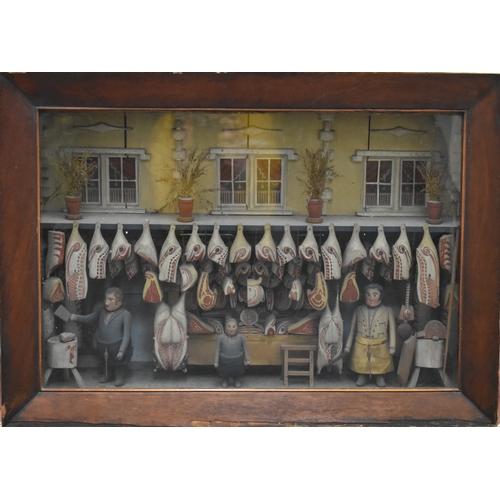 1379 - A 19th century carved and painted wood butcher's shop diorama, the visible area 40 x 60cm, in the or...