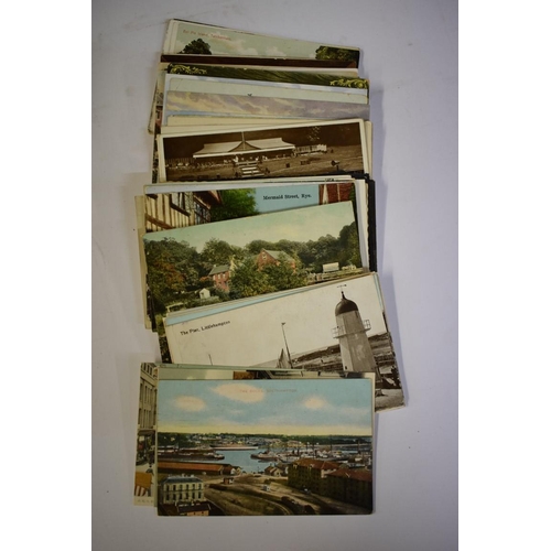 559 - POSTCARDS: a mixed selection, mainly early 20thc British topographical, contained in old wooden... 