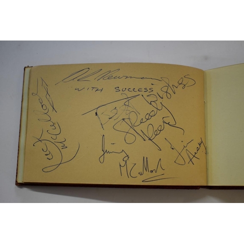 566 - AUTOGRAPH ALBUM: small autograph album, inc. 2 x postcards of The Goodies, signed by each membe... 