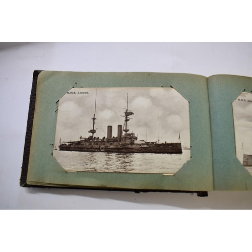 567 - POSTCARD ALBUM: SHIPPING: a good small format album, early 20thc shipping interest, approx 70 cards ... 