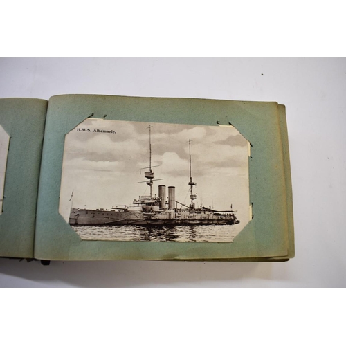 567 - POSTCARD ALBUM: SHIPPING: a good small format album, early 20thc shipping interest, approx 70 cards ... 