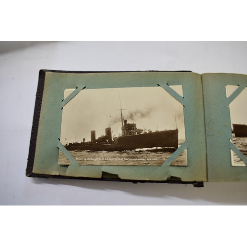 567 - POSTCARD ALBUM: SHIPPING: a good small format album, early 20thc shipping interest, approx 70 cards ... 