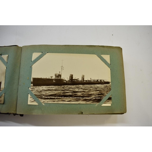 567 - POSTCARD ALBUM: SHIPPING: a good small format album, early 20thc shipping interest, approx 70 cards ... 