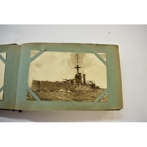 567 - POSTCARD ALBUM: SHIPPING: a good small format album, early 20thc shipping interest, approx 70 cards ... 