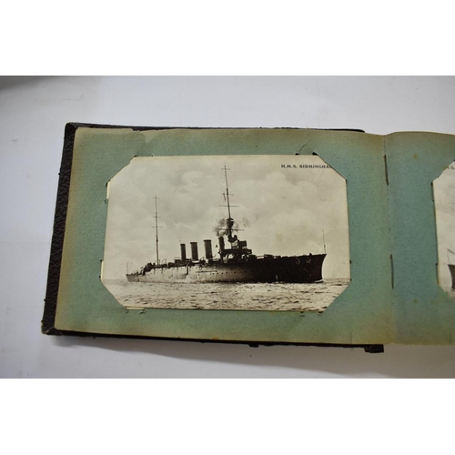 567 - POSTCARD ALBUM: SHIPPING: a good small format album, early 20thc shipping interest, approx 70 cards ... 