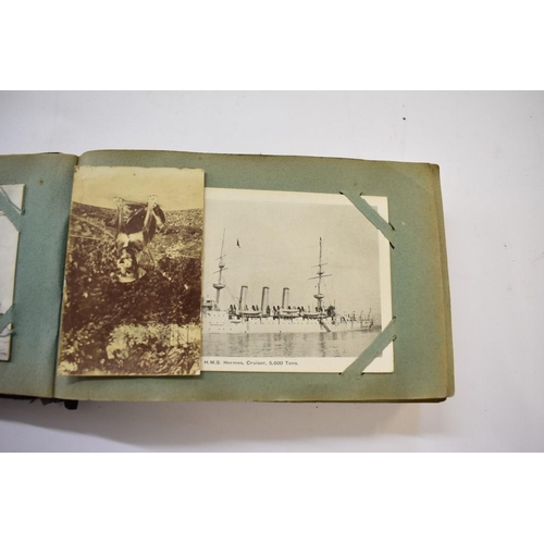 567 - POSTCARD ALBUM: SHIPPING: a good small format album, early 20thc shipping interest, approx 70 cards ... 