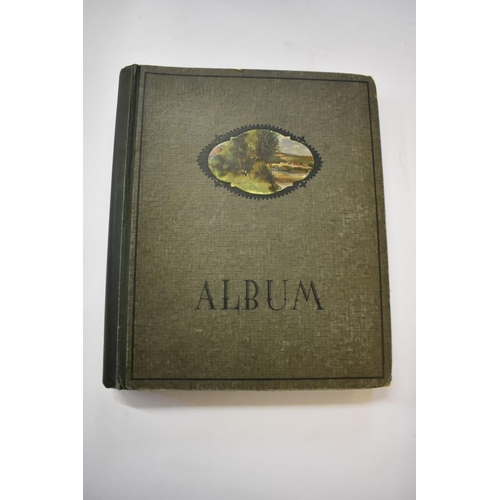 568 - POSTCARD ALBUMS: group of three albums, mixed contents, largely earlier c20 topography and nove... 