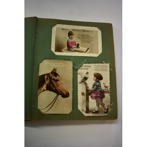 568 - POSTCARD ALBUMS: group of three albums, mixed contents, largely earlier c20 topography and nove... 