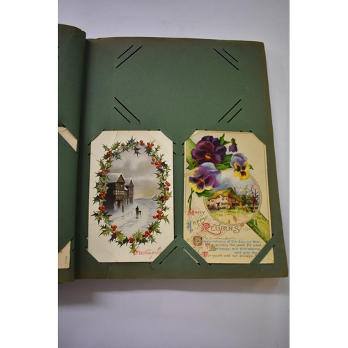 568 - POSTCARD ALBUMS: group of three albums, mixed contents, largely earlier c20 topography and nove... 