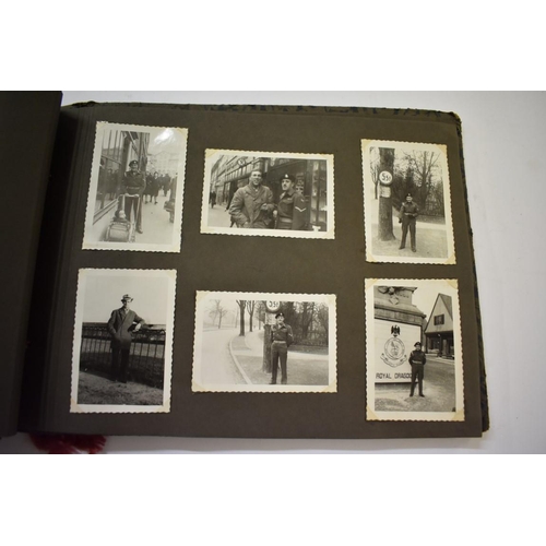 590 - SNAPSHOT ALBUM: British servicemen in post war Germany, album of snapshots corner mounted. (Alb... 