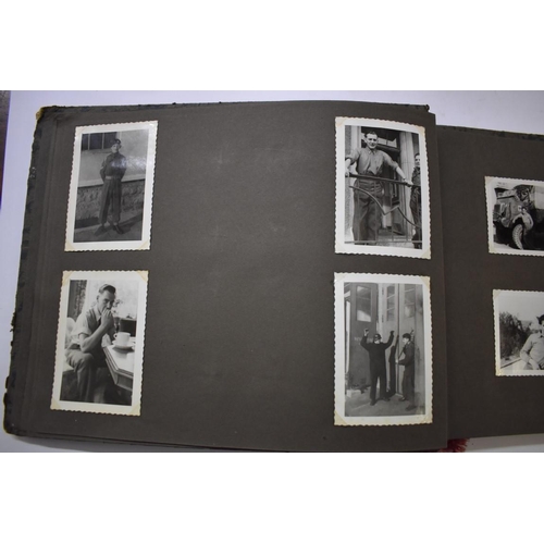 590 - SNAPSHOT ALBUM: British servicemen in post war Germany, album of snapshots corner mounted. (Alb... 