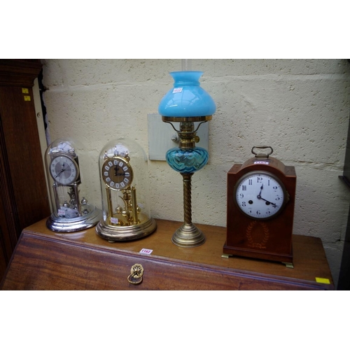 1163 - An Edwardian mahogany and inlaid dome top mantel clock, height including handle 28cm, with pendulum;... 