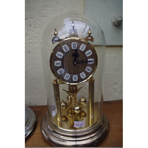 1163 - An Edwardian mahogany and inlaid dome top mantel clock, height including handle 28cm, with pendulum;... 