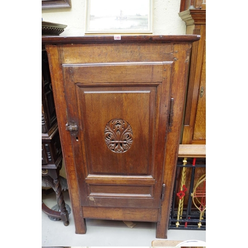 1165 - An 18th century Continental panelled oak single door cupboard, 80cm wide. ... 