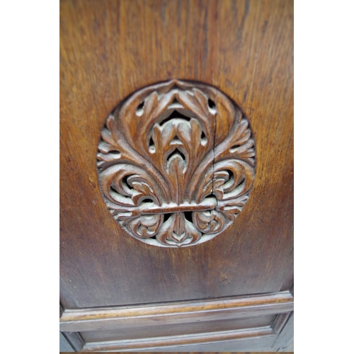 1165 - An 18th century Continental panelled oak single door cupboard, 80cm wide. ... 