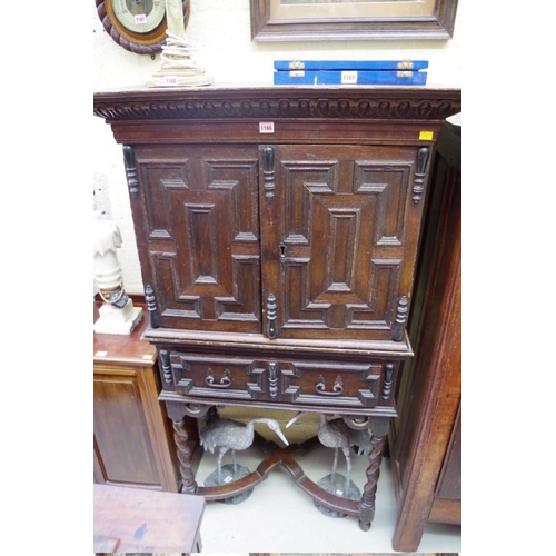 1166 - A late 17th century and later oak cabinet on stand, with geometric moulding and ebonized detail, 89c... 