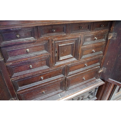 1166 - A late 17th century and later oak cabinet on stand, with geometric moulding and ebonized detail, 89c... 