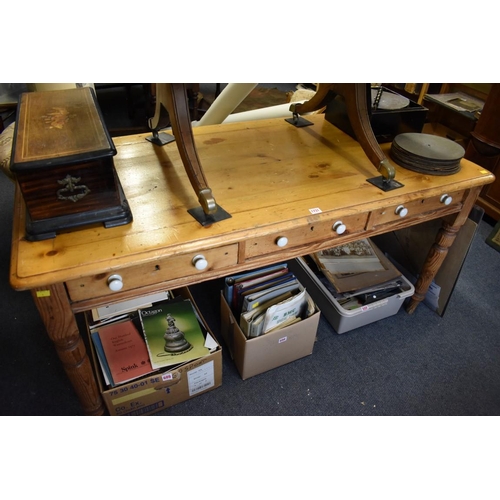 1731 - A Victorian pine and pitch pine table, with three frieze drawers, 150cm long. ... 